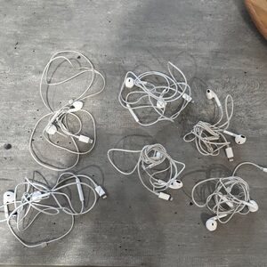 Six sets of apple lightning earbuds 
White Wired Earphones with Microphone